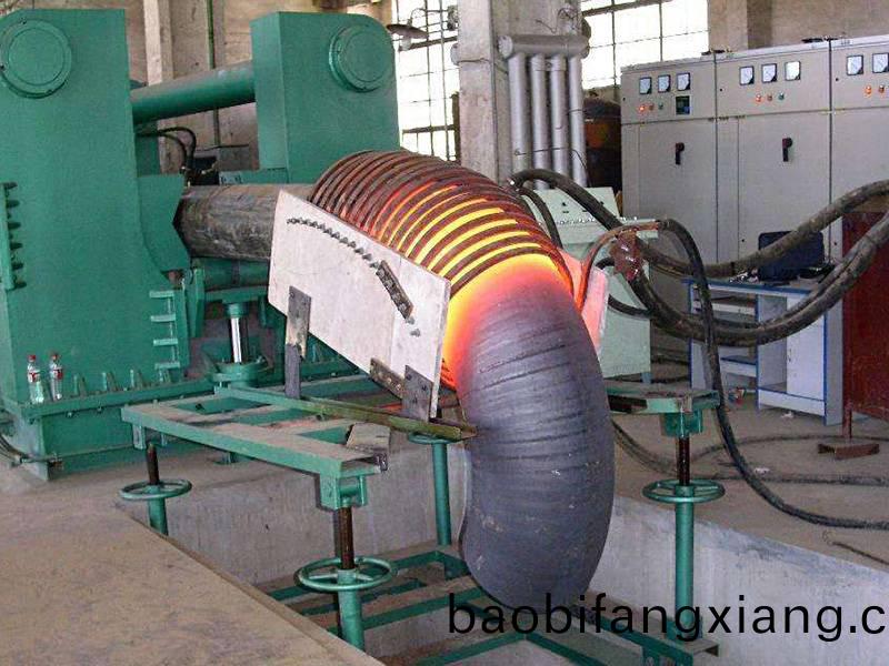 中频弯头推制机